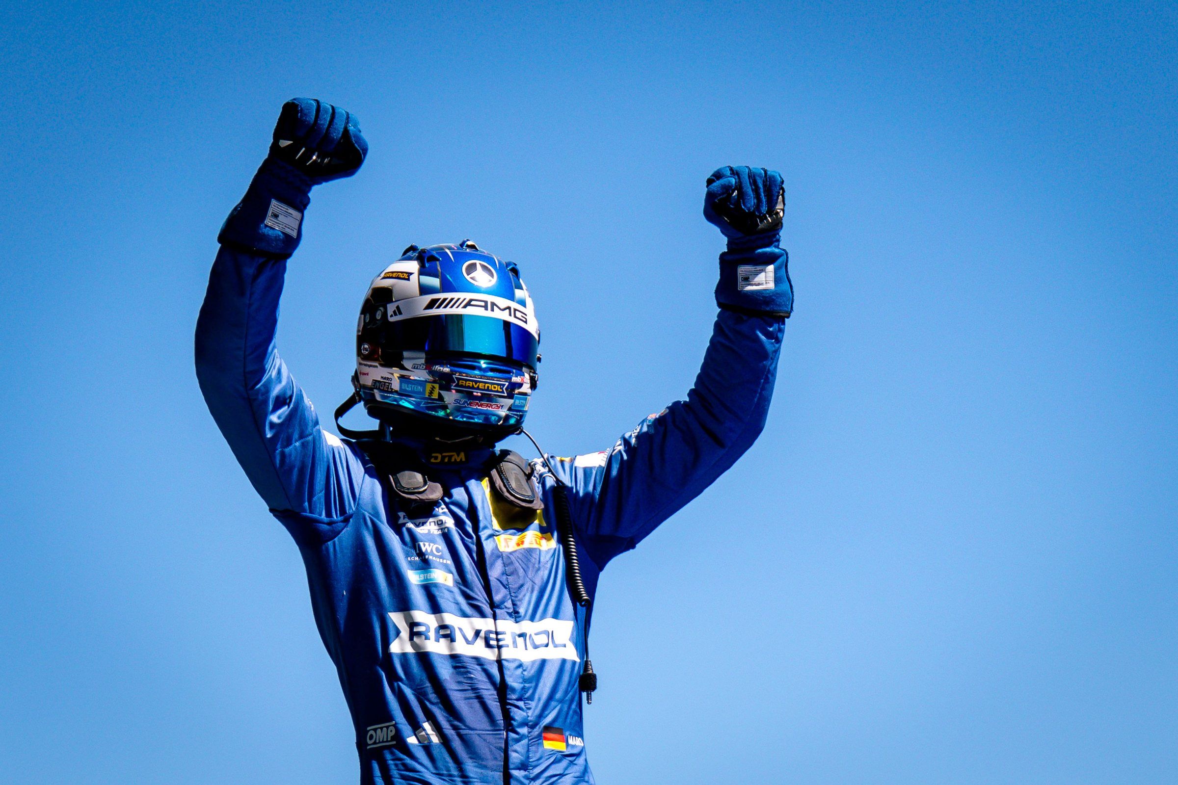 Maro Engel celebrating with both arms raised