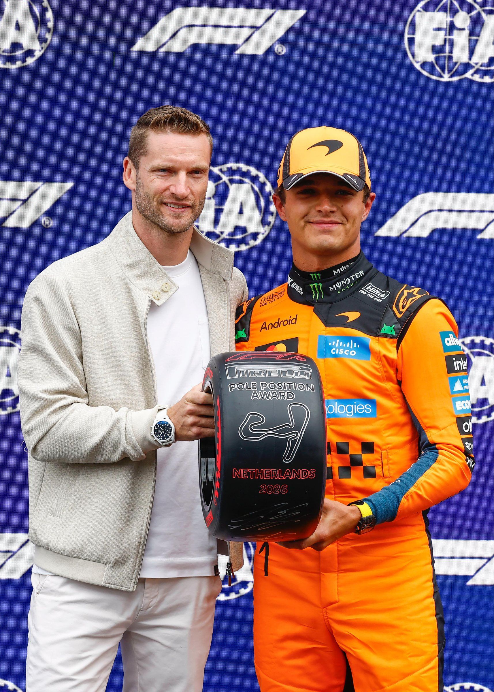 Maro Engel presenting the Formula 1 Pole Position Award at the 2026 Dutch Grand Prix